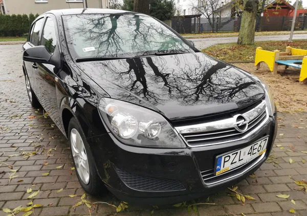 wielkopolskie Opel Astra cena 17500 przebieg: 243080, rok produkcji 2011 z Ostróda